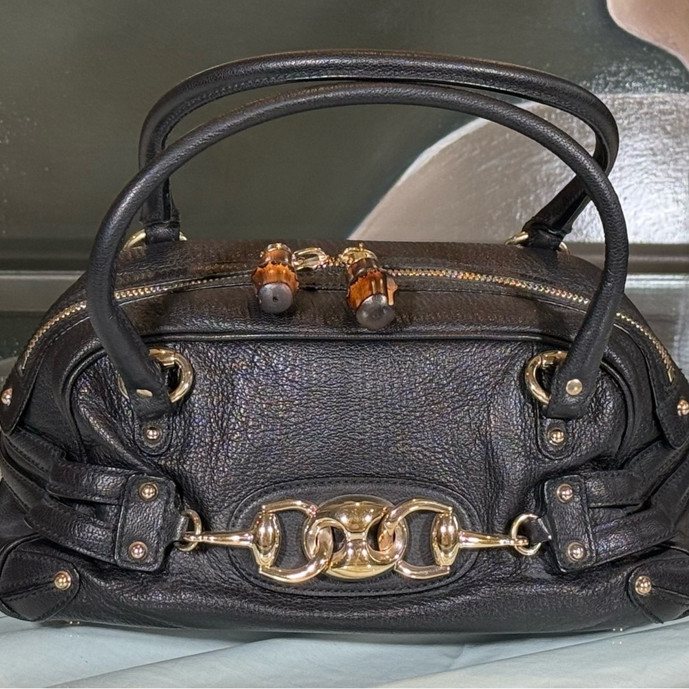 Gucci Chic Black Leather Satchel with Gold Accents